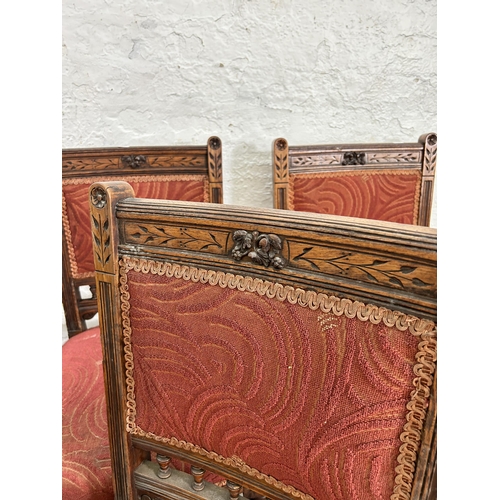 82 - Six Victorian carved oak and red fabric upholstered dining chairs stamped 'Tottie' to base