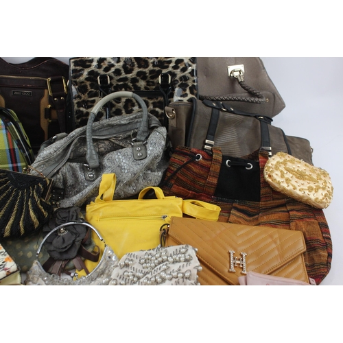 490 - Eighteen handbags and purses to include Guess, Radley, Jimmy Choo etc.