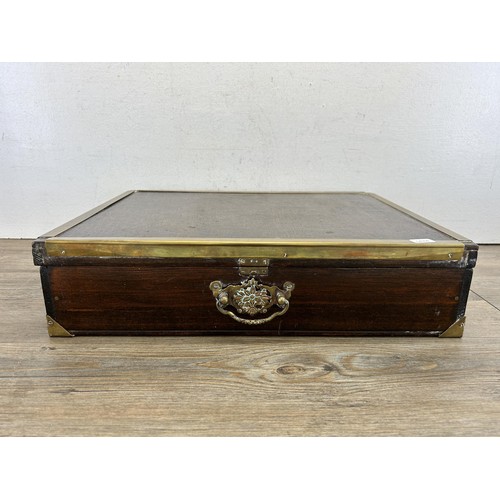 520 - An early/mid 20th century stained hardwood and brass banded box - approx. 11cm high x 46cm wide x 36... 