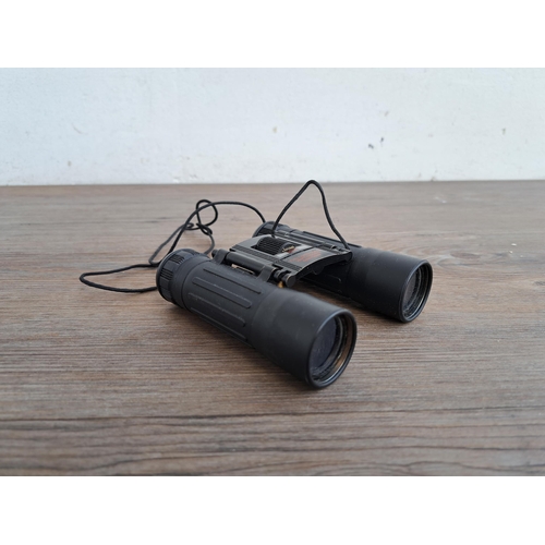 599 - A collection of binoculars to include RSPB 8 x 40 field 8.2, Prakpica Sport 12 x 25 RC etc.