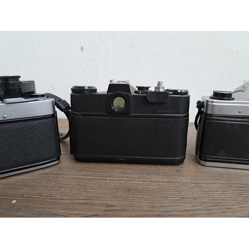 602 - A collection of cameras, lenses and cases to include Yashica J-P camera, Praktica MTL5B, one Zenit E... 