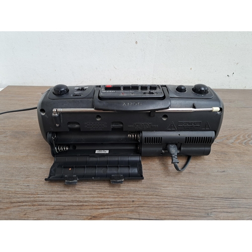 611 - Three items, one Goodmans MD105 CD Mini Hi-Fi system, one Sony CFS-E14L radio cassette-corder and on... 