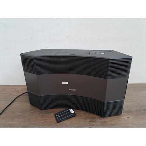 612 - A Bose Acoustic Wave music system model no. CD-3000 and remote