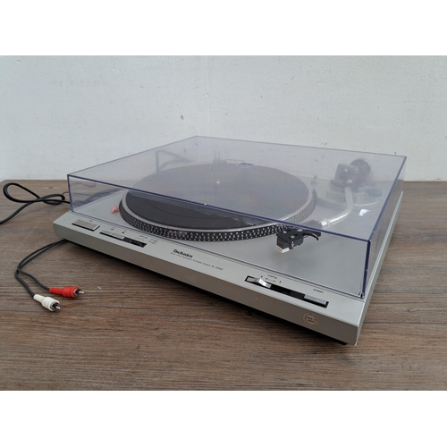 613 - A Technics SL-D202 direct drive automatic turntable system