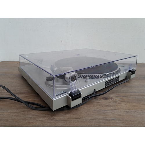 613 - A Technics SL-D202 direct drive automatic turntable system