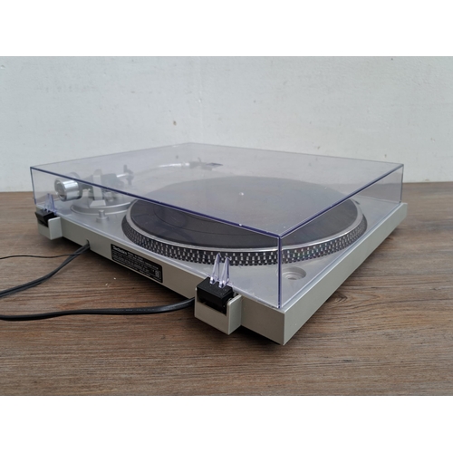 613 - A Technics SL-D202 direct drive automatic turntable system