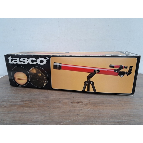 636 - A boxed Tasco 320mm x 60mm 49TR telescope