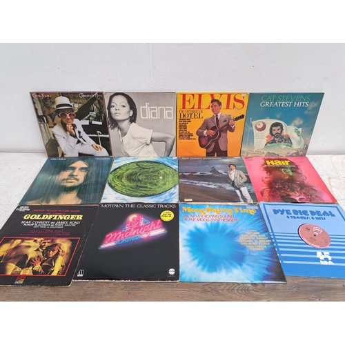 643 - A collection of vinyl records to include Elton John, Diana Ross, Cat Stevens and various compilation... 