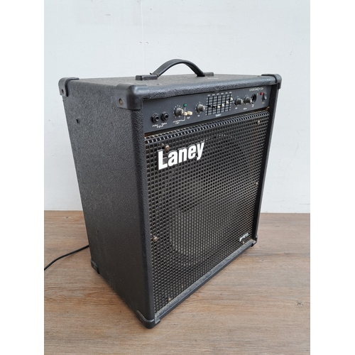 650 - Two items, one Laney HCM120B HardCore Max Combo bass amplifier and a Mirage MFL811 flute