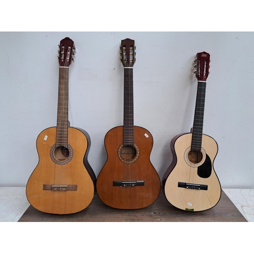 651 - Three laminate acoustic guitars, Hokada, Jose Ferrer and Ready Ace