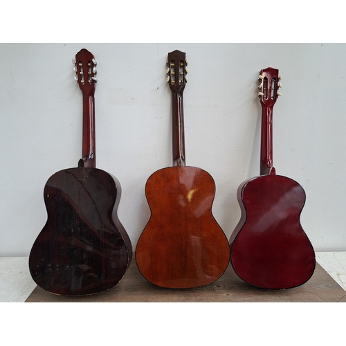 651 - Three laminate acoustic guitars, Hokada, Jose Ferrer and Ready Ace