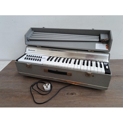 652 - A J. Busilacchio electric reed organ