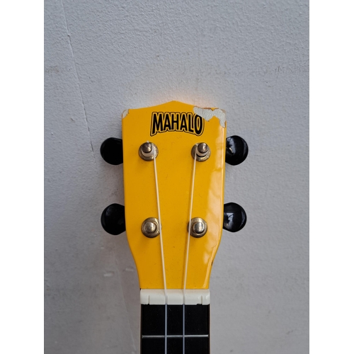 654 - Three items, one Cruiser by Crafter precision style bass guitar, one cased Mahalo yellow smiley face... 