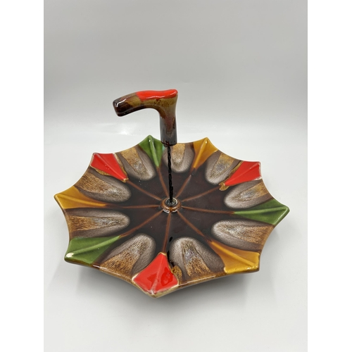 288 - A mid 20th century Vallauris Pottery glazed umbrella cake stand - approx. 18cm high