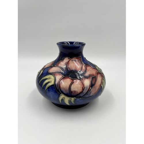 299 - A Moorcroft Anemone pattern vase - approx. 11cm high