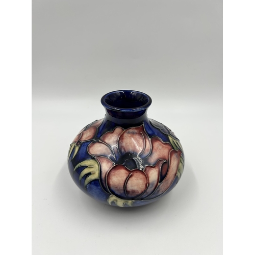 299 - A Moorcroft Anemone pattern vase - approx. 11cm high