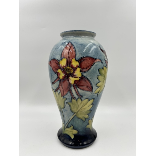 305 - A Moorcroft Columbine pattern vase - approx. 25cm high