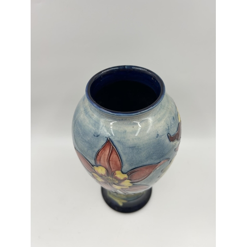 305 - A Moorcroft Columbine pattern vase - approx. 25cm high