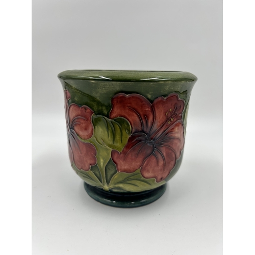 310 - A Moorcroft Hibiscus pattern planter - approx. 12cm high x 14cm diameter