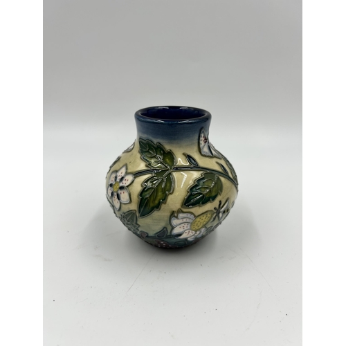 316 - A Moorcroft Fruit Garden pattern vase designed by Nicola Slaney - approx. 8.5cm high