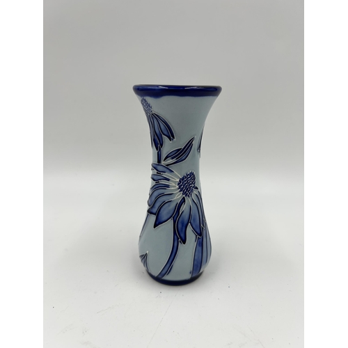 317 - A Moorcroft blue floral pattern vase - approx. 13cm high