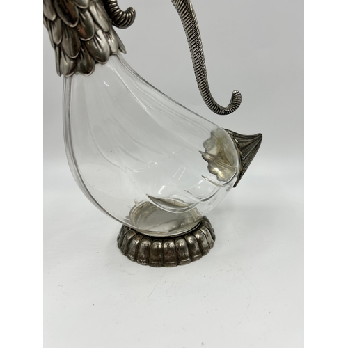 322 - A Selia glass and silver plate duck decanter - approx. 26cm high