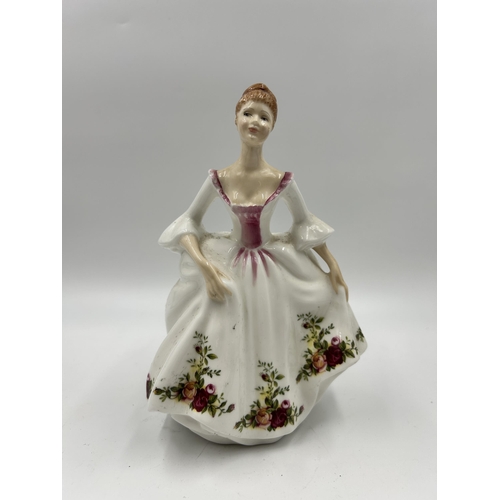 327 - A Royal Doulton Country Rose figurine - HN 3221