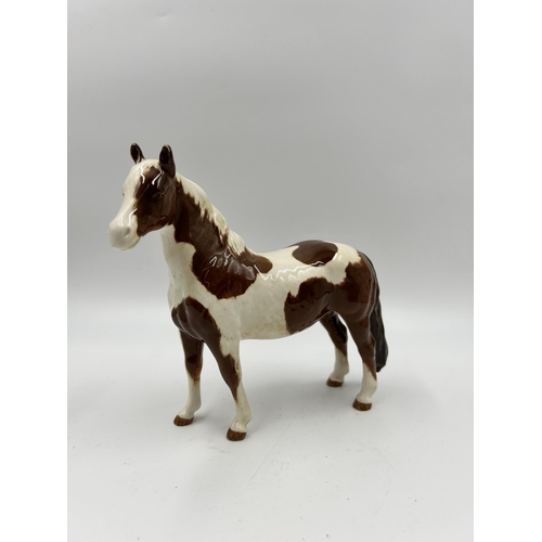 330 - A Beswick no. 1373 Skewbald Pinto pony figurine