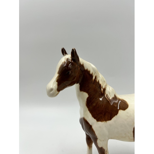 330 - A Beswick no. 1373 Skewbald Pinto pony figurine