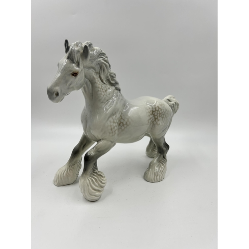 332 - A Beswick no. 975 grey gloss Cantering Shire horse figurine