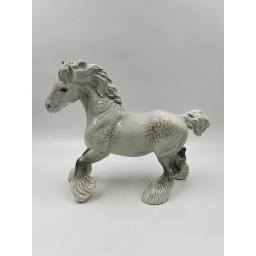 332 - A Beswick no. 975 grey gloss Cantering Shire horse figurine