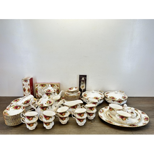 353 - A large collection of Royal Albert Old Country Roses china to include two lidded tureens, two teapot... 