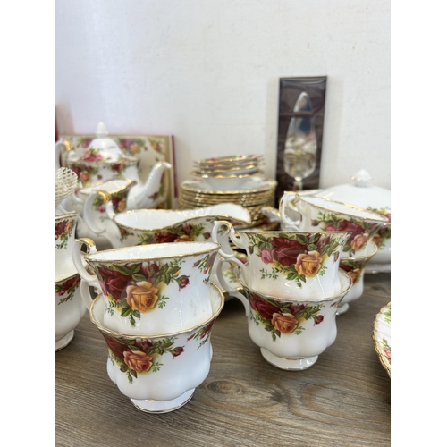 353 - A large collection of Royal Albert Old Country Roses china to include two lidded tureens, two teapot... 