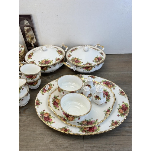 353 - A large collection of Royal Albert Old Country Roses china to include two lidded tureens, two teapot... 