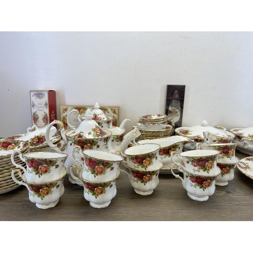 353 - A large collection of Royal Albert Old Country Roses china to include two lidded tureens, two teapot... 