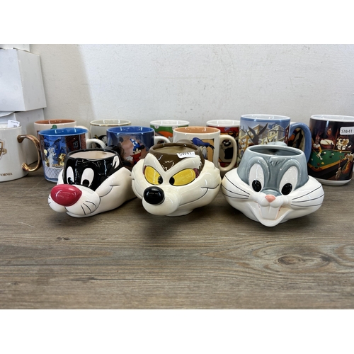 359 - A collection of Warner Bros advertising mugs to include Bugs Bunny, Sylvester etc. together with a W... 