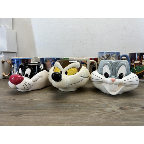 359 - A collection of Warner Bros advertising mugs to include Bugs Bunny, Sylvester etc. together with a W... 