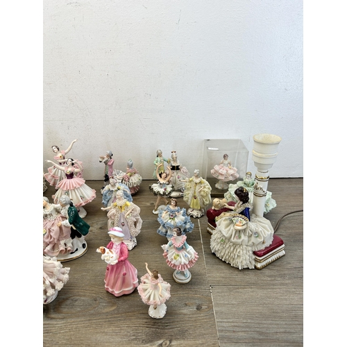 362 - A collection of mainly Dresden porcelain lace figurines