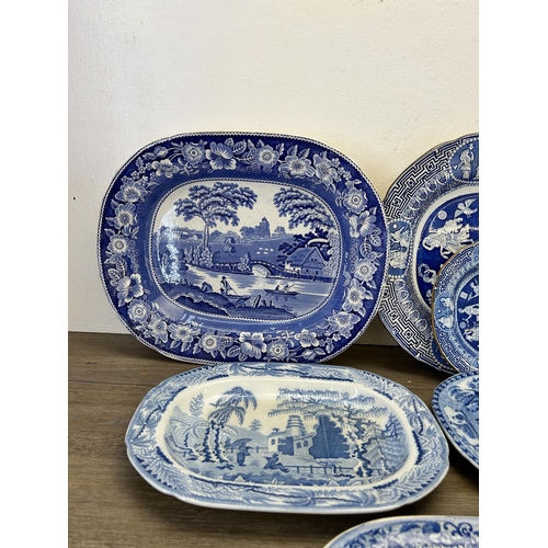 367 - Nine 19th century and later blue and white serving dishes and meat plates to include Spode, Booths e... 