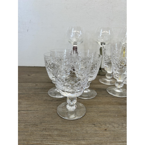 372 - A collection of cut crystal glassware to include set of four Stuart sherry glasses, ten Stuart stemm... 