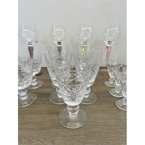 372 - A collection of cut crystal glassware to include set of four Stuart sherry glasses, ten Stuart stemm... 