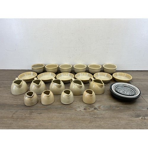 382 - A collection of studio pottery to include Dudson Evolution etc.