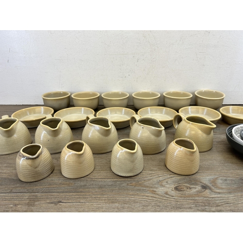 382 - A collection of studio pottery to include Dudson Evolution etc.