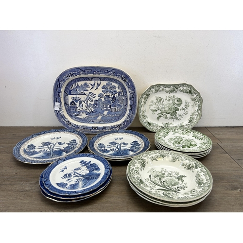 387 - A collection of ceramic plates and dishes to include Booths Real Old Willow, Copeland Rd No. 180 etc... 