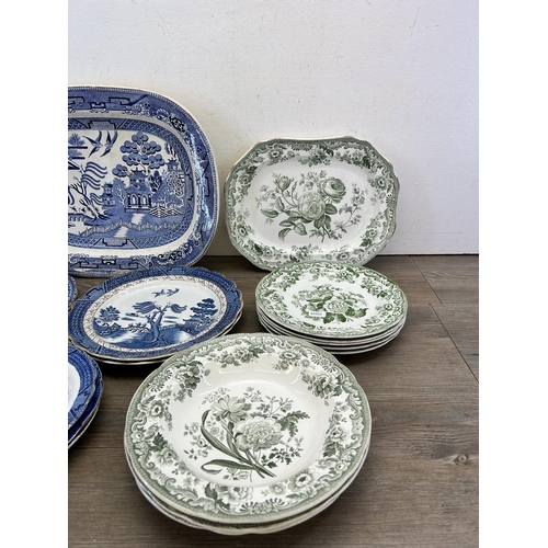 387 - A collection of ceramic plates and dishes to include Booths Real Old Willow, Copeland Rd No. 180 etc... 