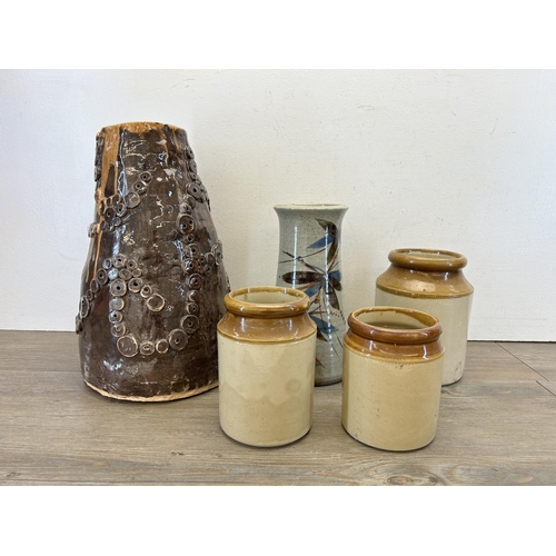 393 - Five pieces of stoneware pottery to include three salt glazed storage jars, Ireland Pottery Anglesey... 