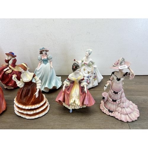 399 - Nine ceramic figurines, six Royal Doulton and three Coalport