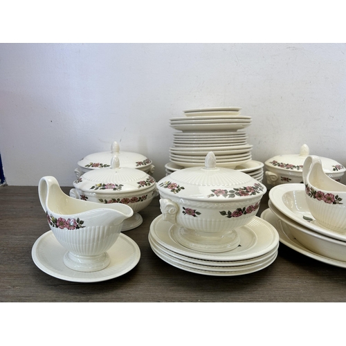 400 - A large collection of Wedgwood Briar Rose fine bone china to include four lidded tureens, two gravy ... 