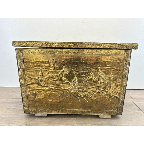 406 - A mid 20th century embossed brass coal box - approx. 32cm high x 45cm wide x 29cm deep