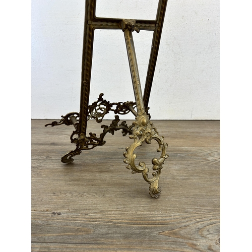 414 - A Rococo style gilt metal easel - approx. 54cm high x 27cm wide